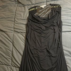 Peter Nygard black dress with gold chains on shoulder